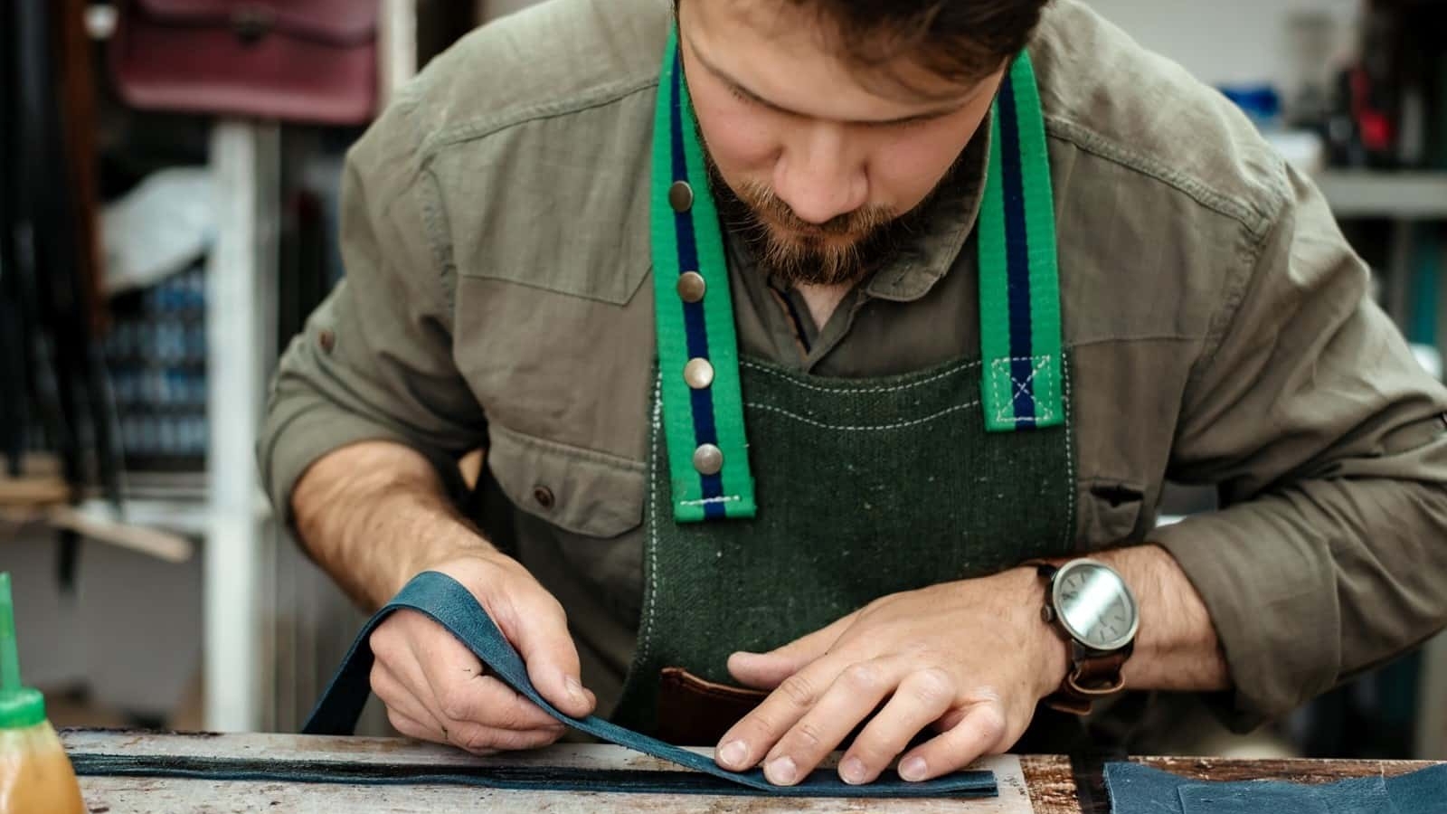 Craftsman applying cyanocrylate glue